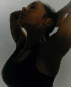 woman relaxing after workout for recovery and wellness