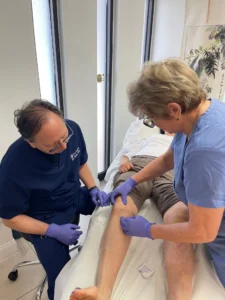 medical treatment for knee joint performed by healthcare professionals