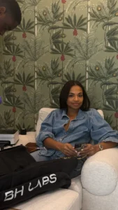 client relaxing during compression therapy session for recovery and circulation