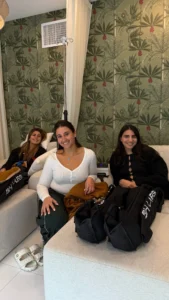 group of clients relaxing during compression therapy sessions at a wellness center