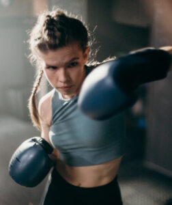 woman boxing workout for strength, endurance, and performance training